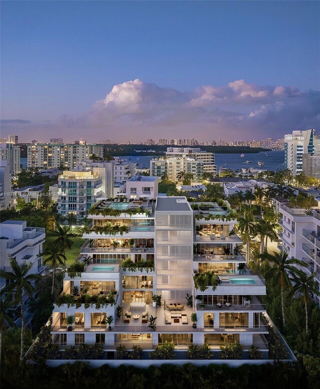 1130 100th St Unit 4C, Bay Harbor Islands, FL 33154 - aerial view at dusk of a view of city