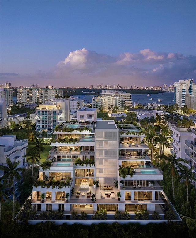 1130 100th St Unit 4D, Bay Harbor Islands, FL 33154 - aerial view at dusk of a city view