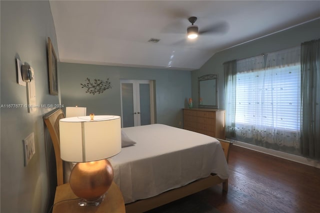 bedroom featuring dark wood-type flooring, ceiling fan, and lofted ceiling