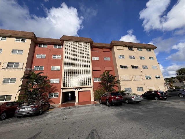 5300 Washington St Unit U103, Hollywood, FL 33021 - view of property with uncovered parking