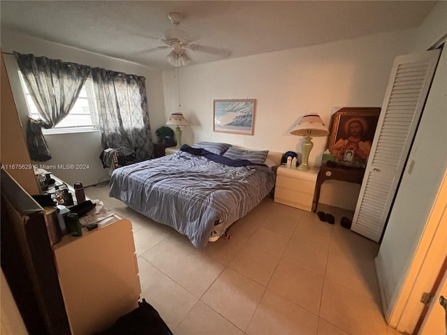 5300 Washington St Unit U103, Hollywood, FL 33021 - bedroom with light tile patterned flooring and a ceiling fan
