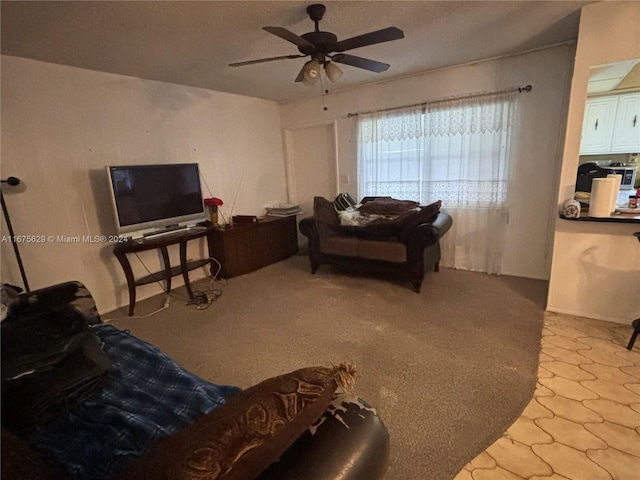 living room with ceiling fan