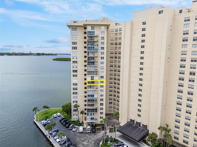 view of building exterior with a water view