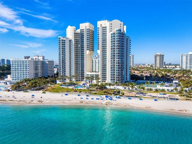 bird's eye view with a view of the beach and a water view