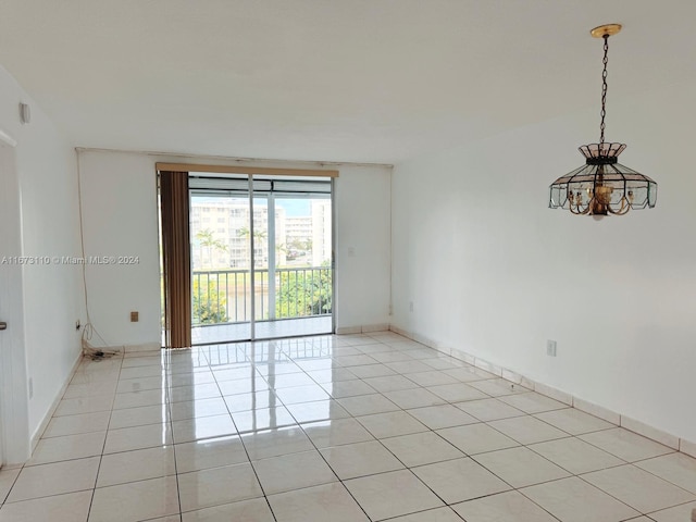 unfurnished room featuring light tile patterned flooring