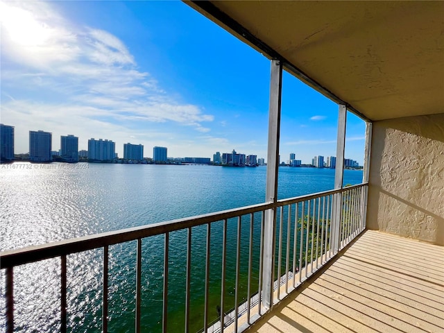 balcony featuring a water view