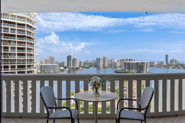 balcony with a city view and a water view