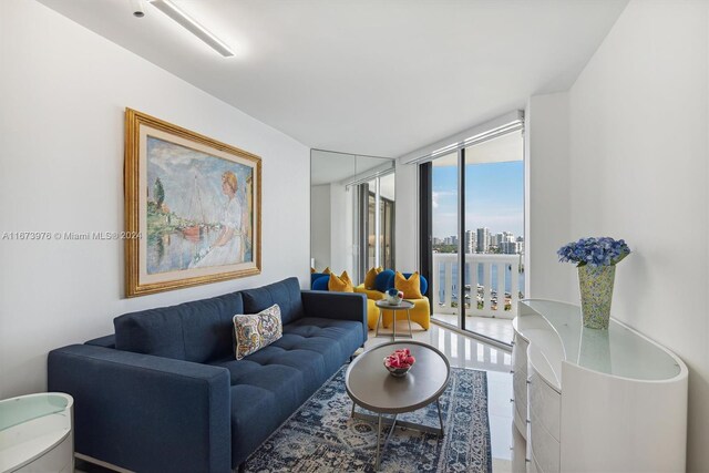 living room featuring a wall of windows