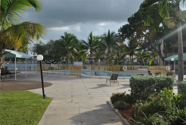 exterior space with a patio area and a swimming pool