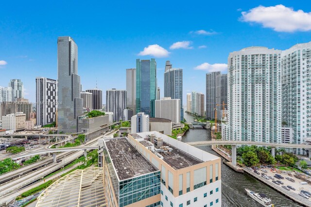 property's view of city with a water view