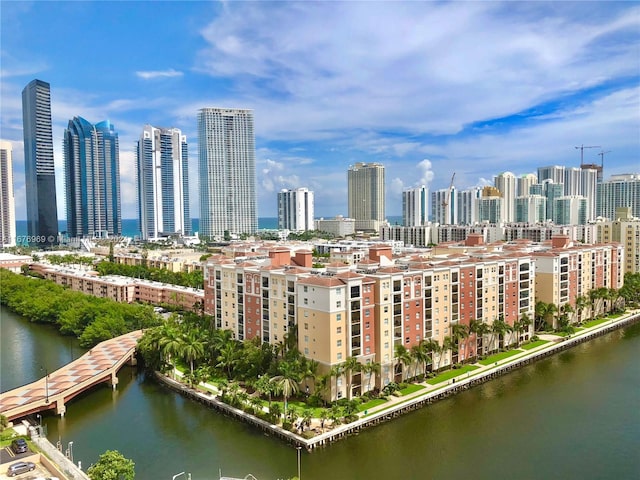 property's view of city with a water view