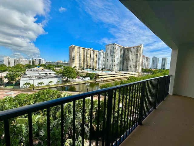 balcony featuring a water view