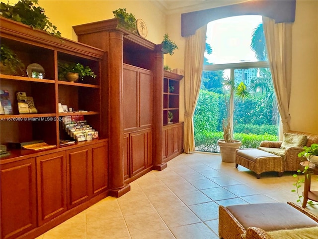 17150 N Bay Rd Unit 2614, Sunny Isles Beach, FL 33160 - sitting room featuring light tile patterned floors and crown molding