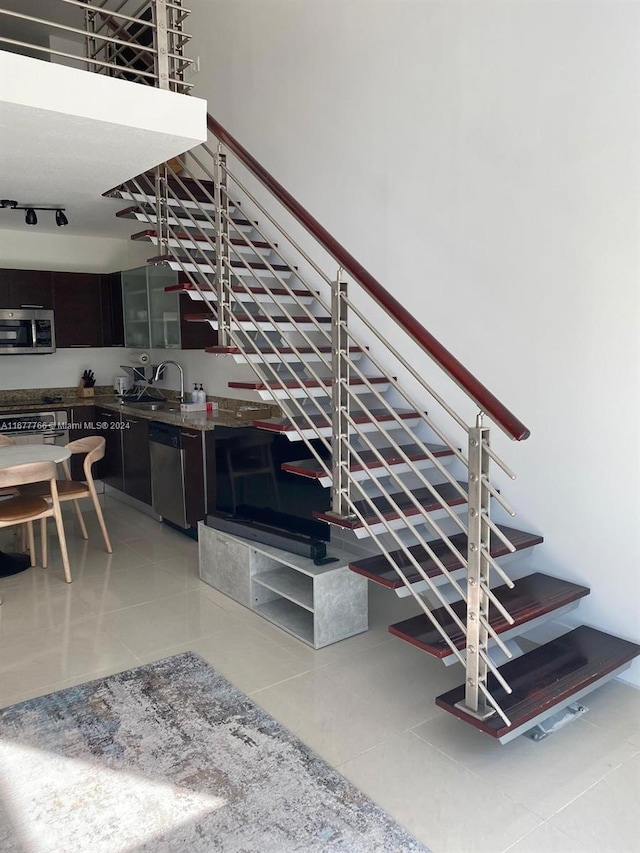 stairs featuring sink