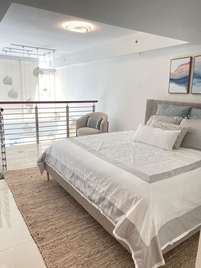 tiled bedroom with track lighting