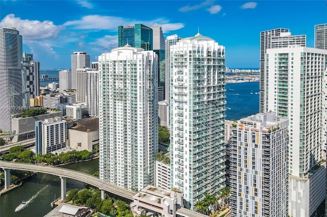 property's view of city featuring a water view