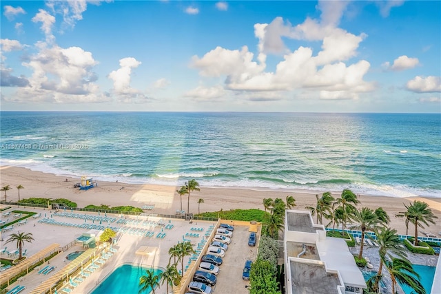 aerial view featuring a beach view and a water view