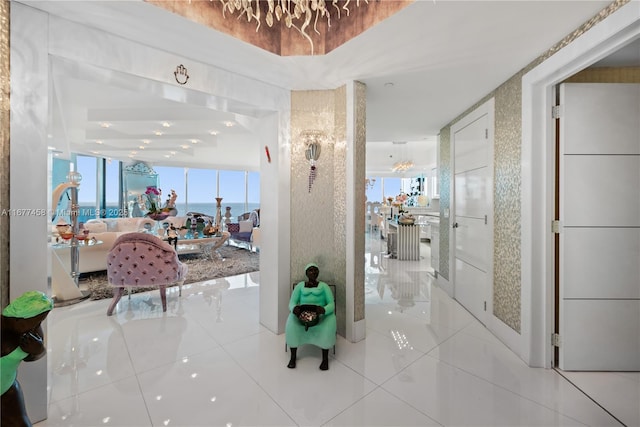 hallway featuring tile patterned floors and plenty of natural light