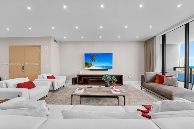 living room featuring expansive windows