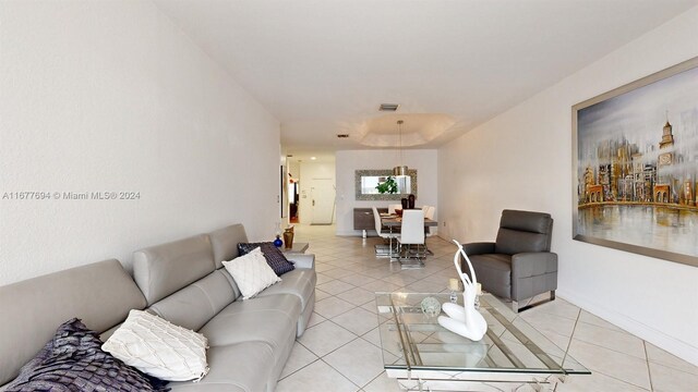 living room featuring light tile patterned floors