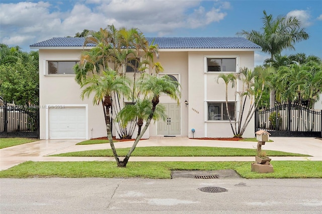 view of front of property with a garage