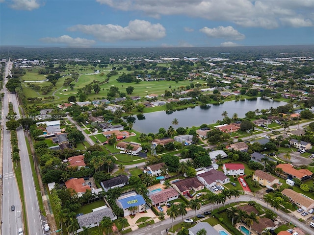 bird's eye view with a water view