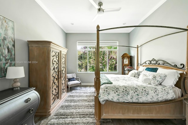 bedroom featuring ceiling fan, crown molding, and dark hardwood / wood-style floors