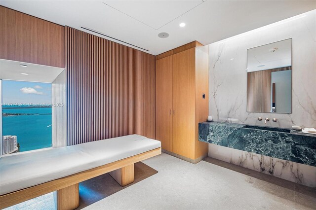 bathroom with vanity and a water view