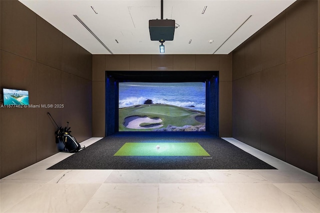 home theater room with golf simulator