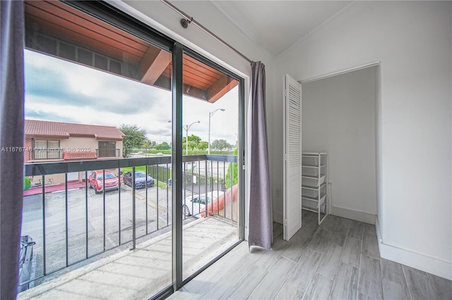 balcony featuring hardwood / wood-style floors