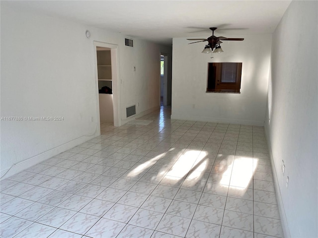 spare room featuring ceiling fan