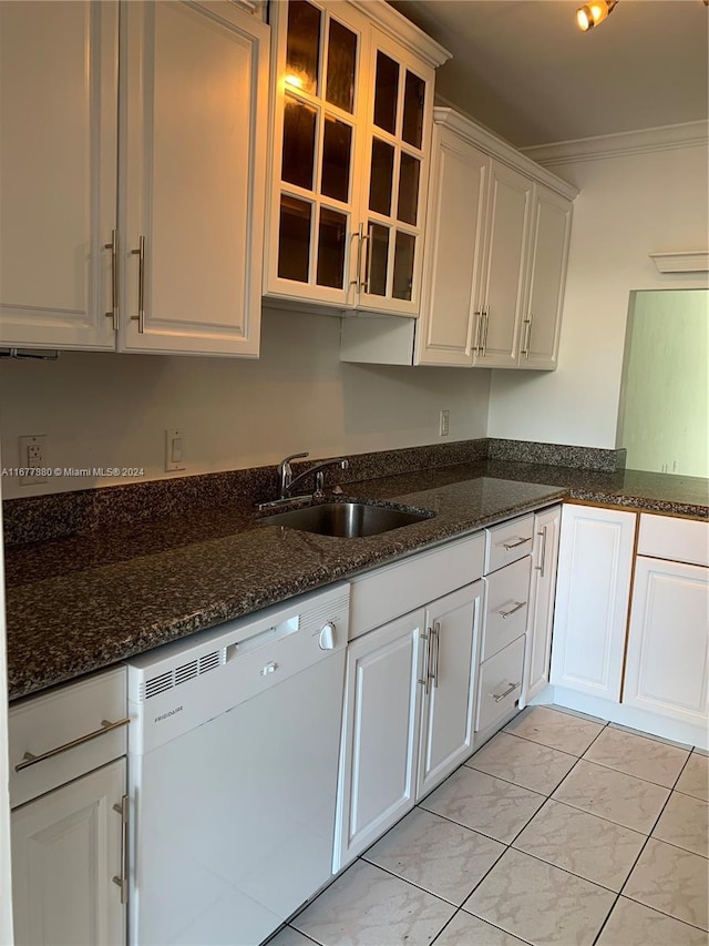 251 Galen Dr Unit 204E, Key Biscayne, FL 33149 - kitchen with white dishwasher, crown molding, glass insert cabinets, white cabinets, and dark stone counters