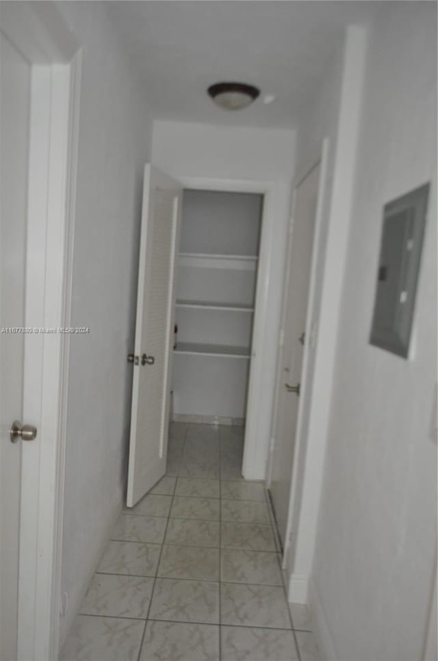 hallway with electric panel