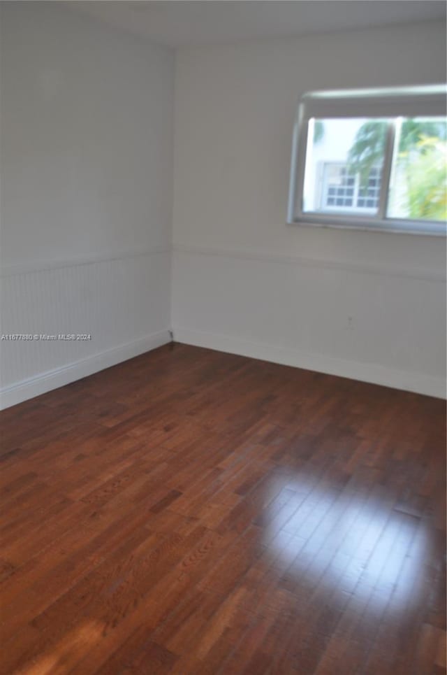 251 Galen Dr Unit 204E, Key Biscayne, FL 33149 - spare room with dark wood-style floors and baseboards