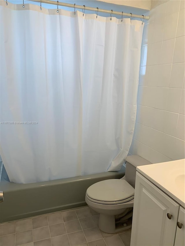 251 Galen Dr Unit 204E, Key Biscayne, FL 33149 - full bathroom featuring shower / bath combo with shower curtain, vanity, and tile patterned flooring
