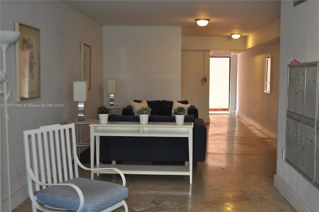 living room featuring concrete floors and radiator heating unit