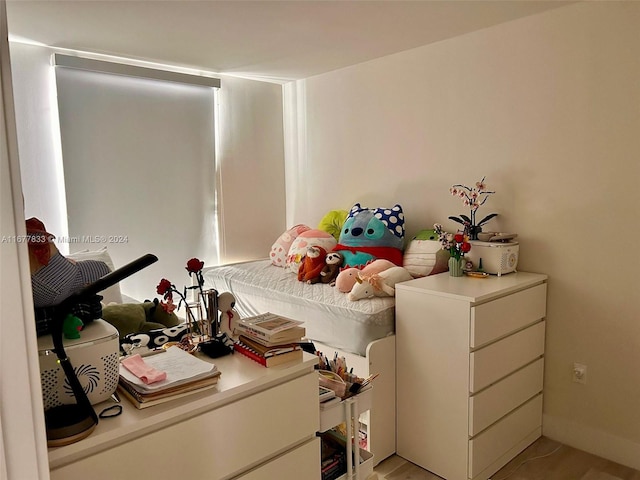 bedroom featuring light wood-type flooring