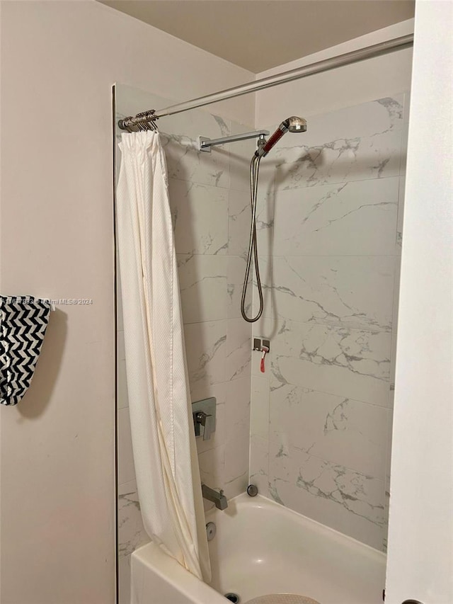 bathroom featuring shower / tub combo