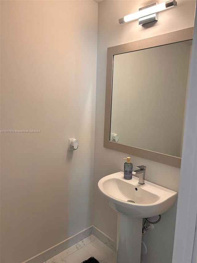 bathroom featuring tile patterned flooring