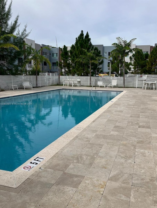 view of pool with a patio