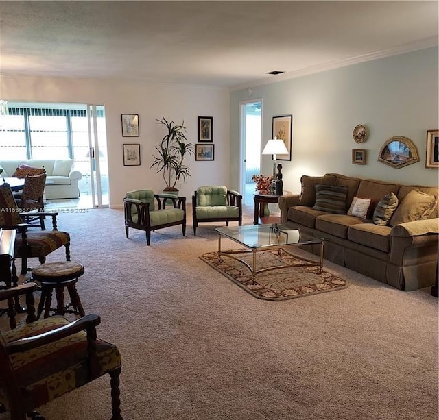 carpeted living room featuring crown molding