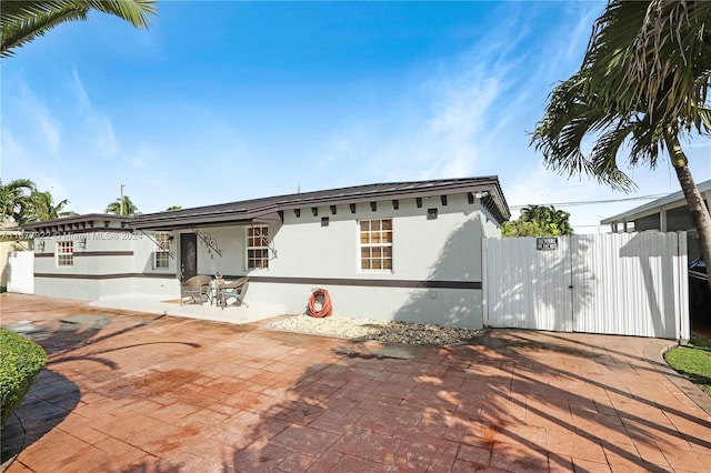 view of front of property with a patio area