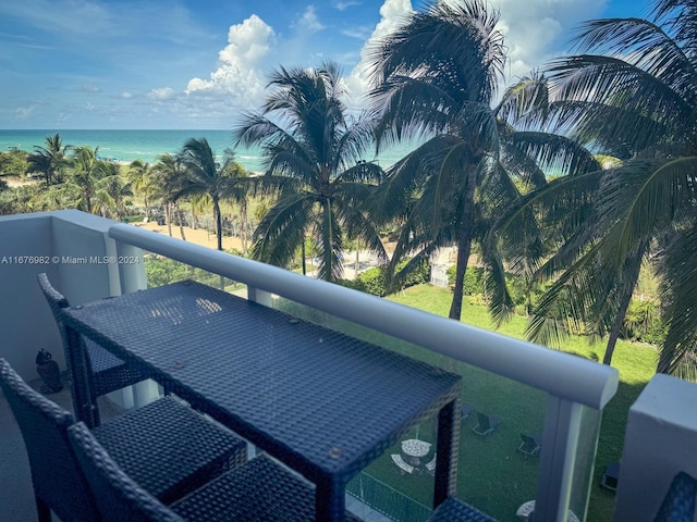 balcony featuring a water view