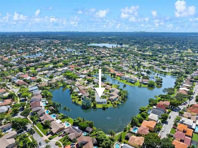 drone / aerial view with a water view