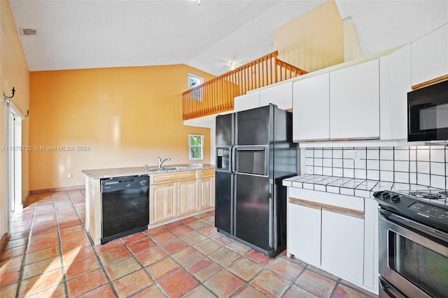 kitchen featuring black appliances, sink, white cabinets, high vaulted ceiling, and decorative backsplash