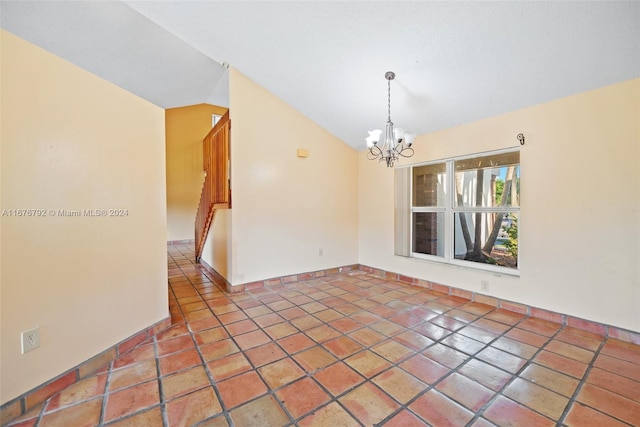 unfurnished room with an inviting chandelier and lofted ceiling