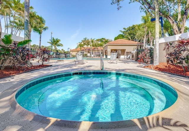 view of pool featuring a patio area