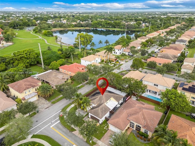 birds eye view of property featuring a water view