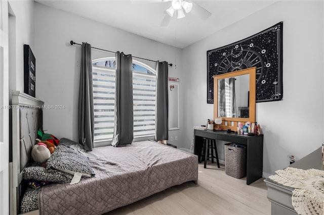 bedroom featuring light hardwood / wood-style flooring and ceiling fan