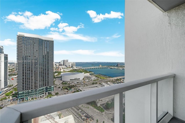 balcony featuring a water view